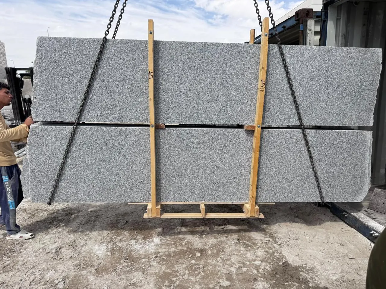 Granite slabs stored on A-frames at the factory